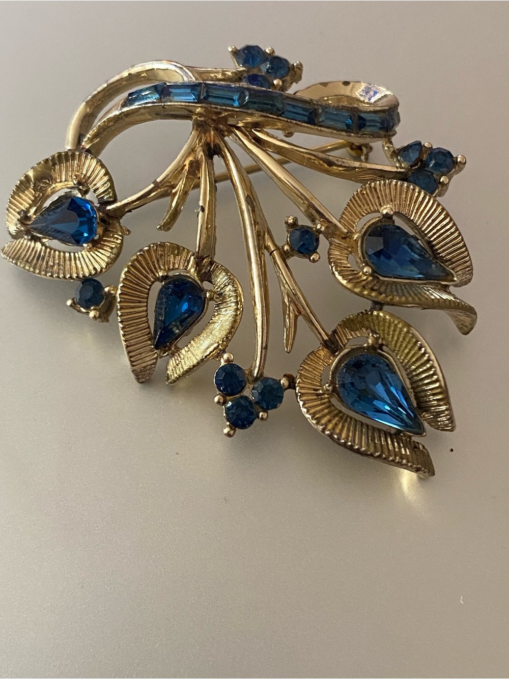 Coro Gold-Tone Floral Brooch with Deep Blue Teardrop Stones